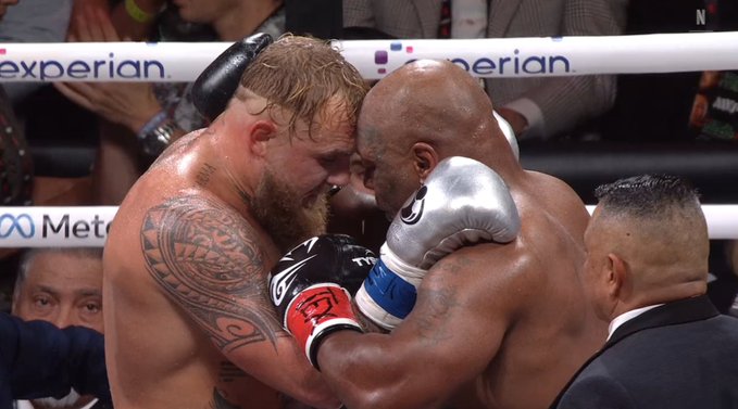 Jake Paul and Mike Tyson at the end of 8 rounds.