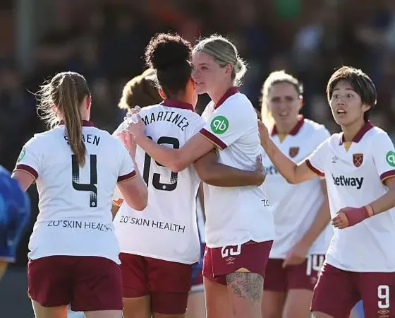 West Ham United’s Shekiera Martinez, centre left, Seraina Piubel, left, Manuela Pavi, centre right, and Oona Siren after the English Women’s Super League football match between Chelsea and West Ham at Kingsmeadow, London, Sunday, March 30, 2025. | Photo Credit: AP