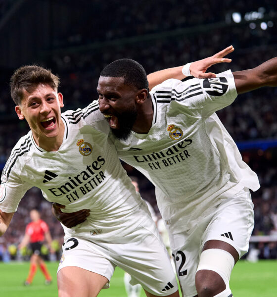 Real Madrid players celebrating on the field.