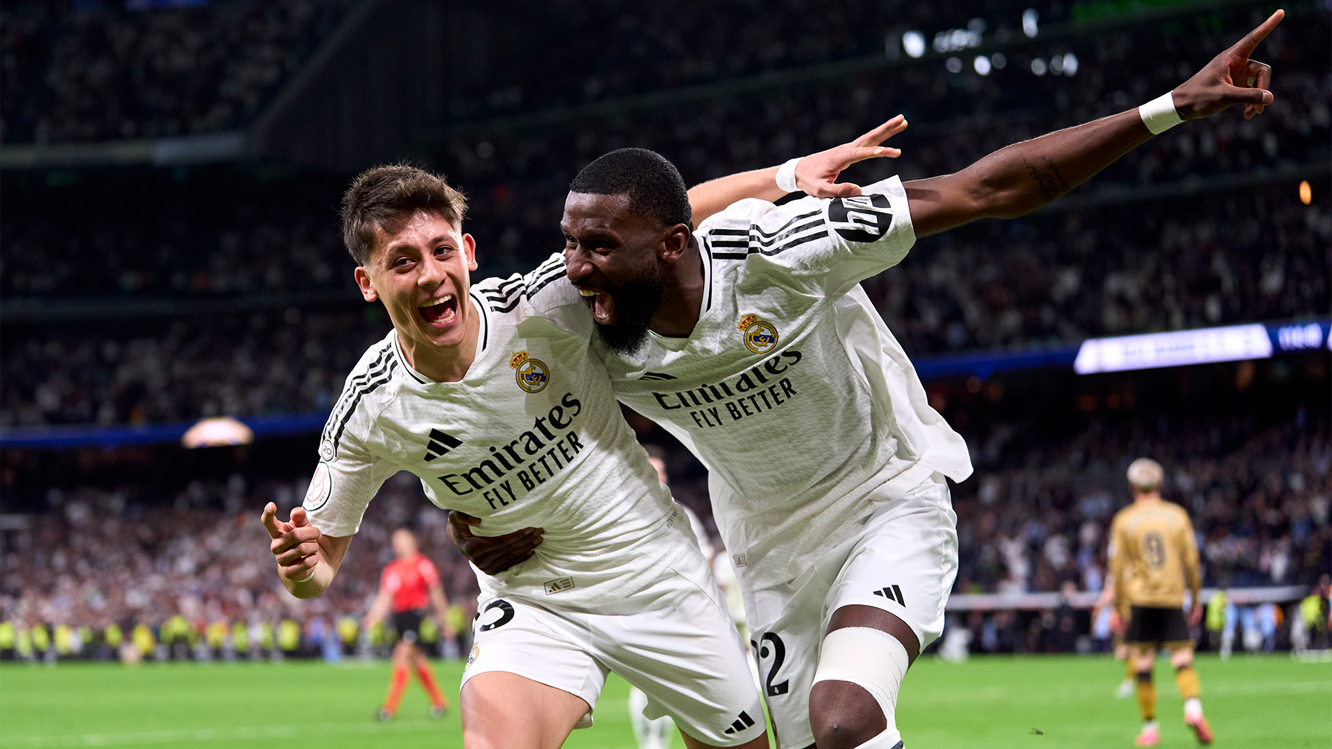 Real Madrid players celebrating on the field.