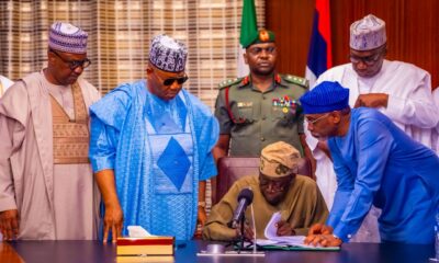President Tinubu, flanked by top-ranking officials including Senate President Godswill Akpabio and House of Representatives Speaker Tajudeen Abbas