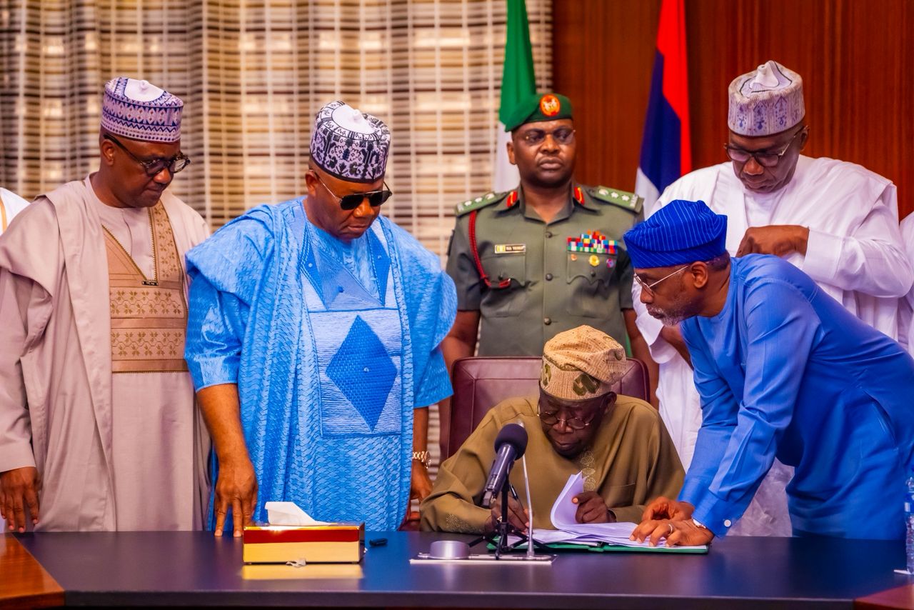 President Tinubu, flanked by top-ranking officials including Senate President Godswill Akpabio and House of Representatives Speaker Tajudeen Abbas