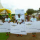 The winners pose with their checks