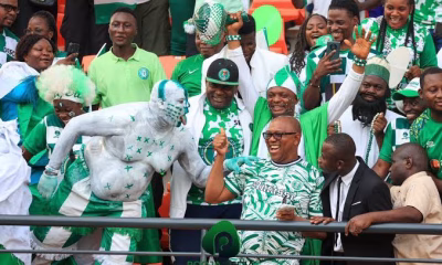 Photo of Peter Obi middle during Super Eagles Match in Uyo
