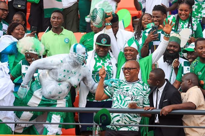 Photo of Peter Obi middle during Super Eagles Match in Uyo