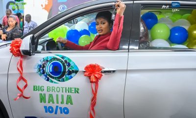 Imisi Ayanwale beams with joy as she enters her BBNaija Season 10 SUV in Lagos.