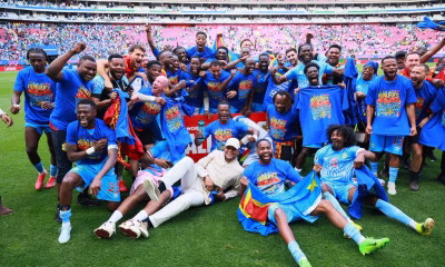 DR Congo players celebrate World Cup qualification after beating Jamaica