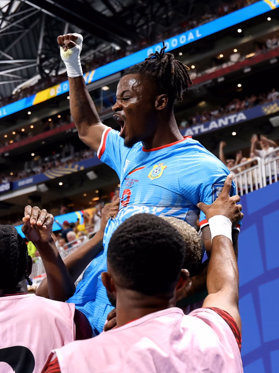 Brian Cipenga celebrates after scoring DR Congo's opening goal against England in the FIFA World Cup 2026 Round of 32 match in Atlanta.
