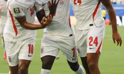 England players celebrate after defeating France 6-4 in the FIFA World Cup 2026 third-place playoff.